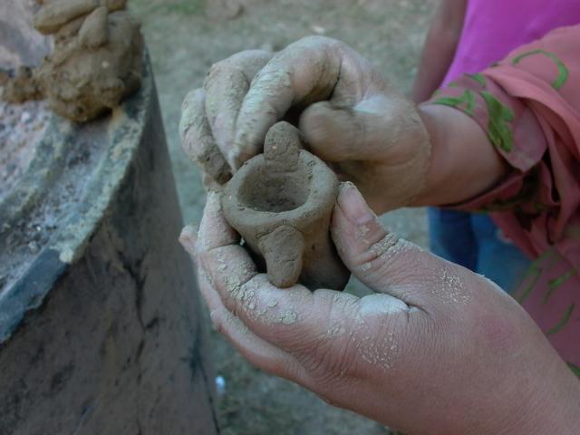 hands on clay